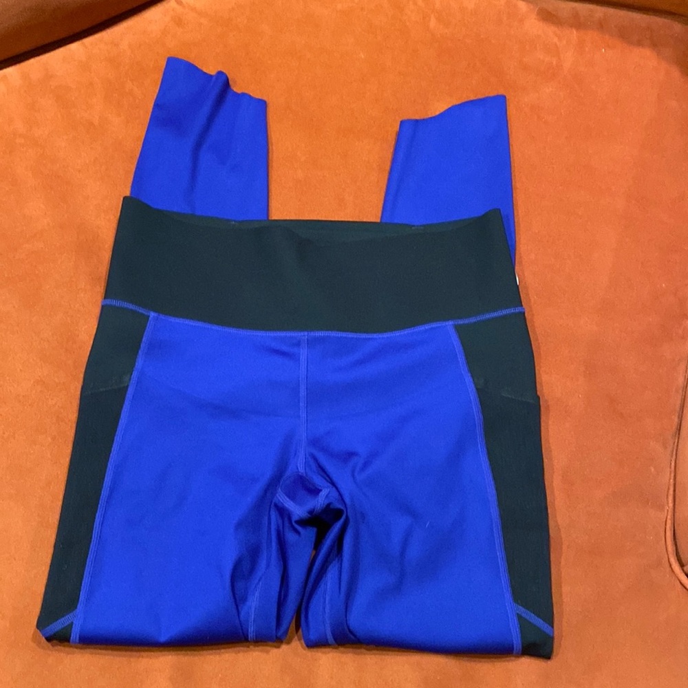 Under Armor blue and black leggings size Large, 26” long